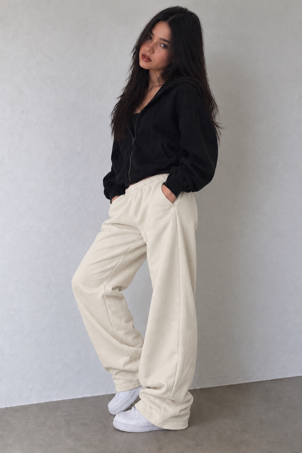 Model wearing Cream Sweats