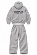 Grey Essentials hoodie and matching wide-leg sweatpants set