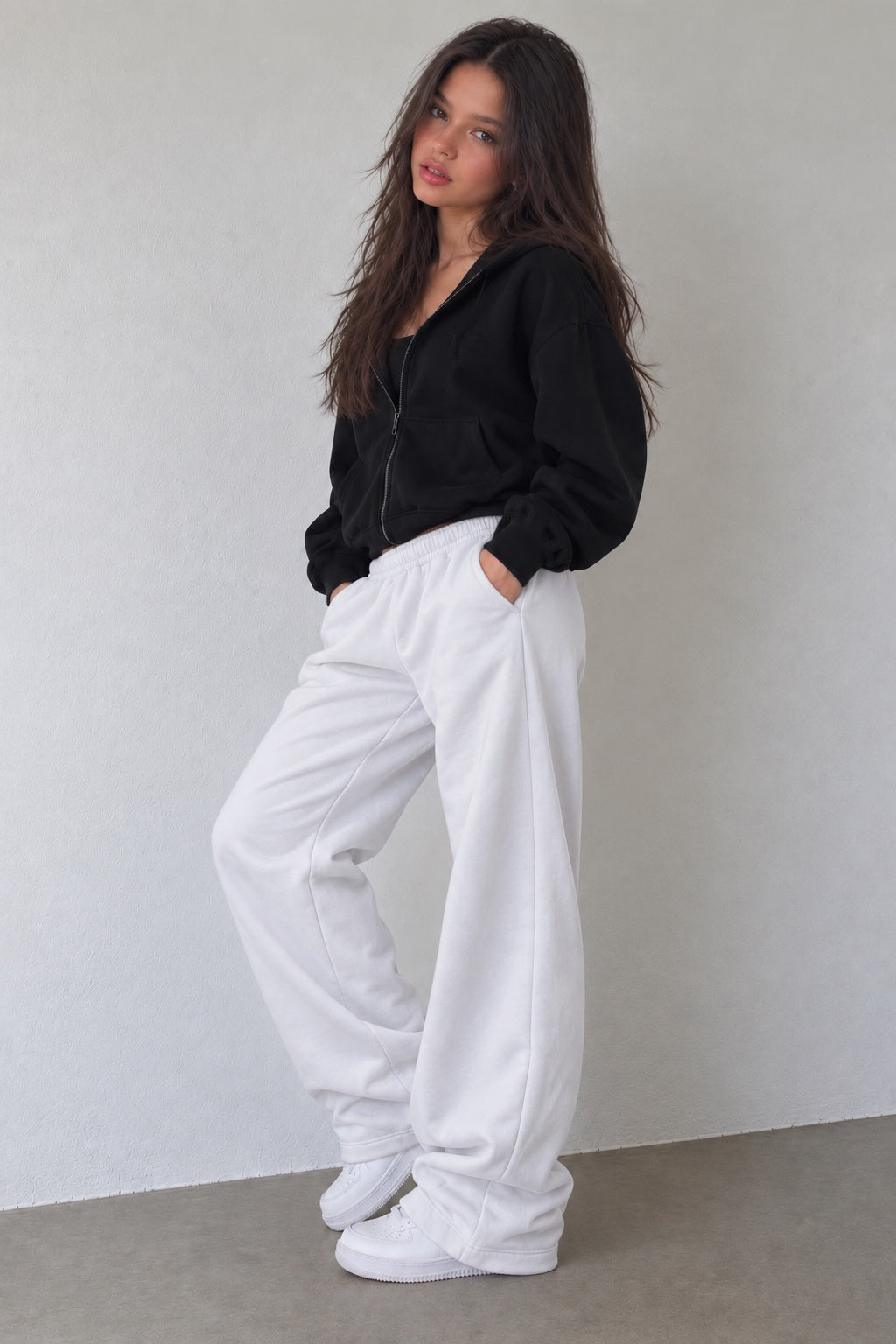 Model wearing White Sweats